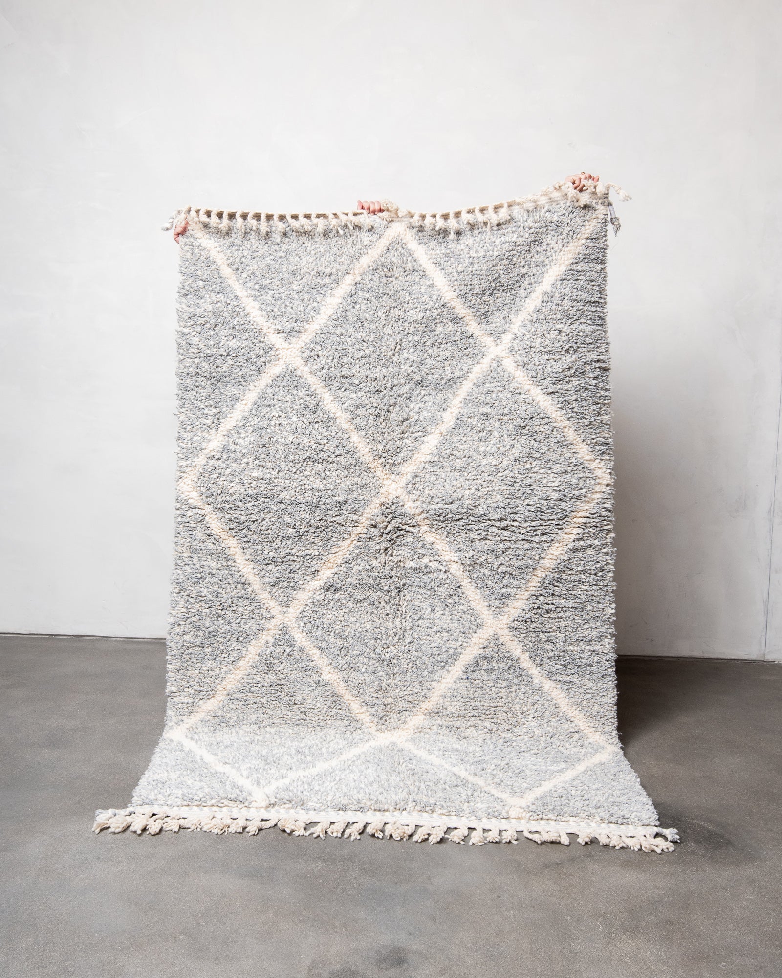 Modern, designer, handcrafted Berber rug from Morocco. Beniourain carpet with beautiful colours and patterns and fluffy wool texture.